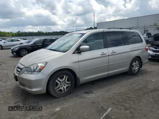 2006 Honda Odyssey EX with VIN 5FNRL38416B455666, listed as a Copart auction lot 64865565 with 180,037 mi miles and Clean title. Bid and sale history available at DreamBid. Image 1.