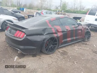 2017 Ford Mustang GT with VIN 1FA6P8CF9H5313475, listed as a IAAI auction lot 42069800 with 70,882 mi miles and . Bid and sale history available at carsss.com. Image 4.
