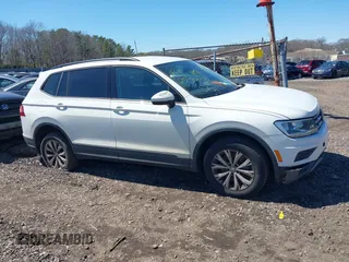 2018 Volkswagen Tiguan S z VIN 3VV1B7AX5JM043090, wystawiony jako IAAI lot #41998165 z przebiegiem Nie podano mil oraz . Historia ofert i sprzedaży dostępna na DreamBid. Obrazek 12.