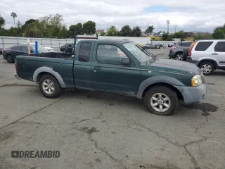 2002 Nissan Frontier XE with VIN 1N6DD26S12C332098, listed as a Copart auction lot 54601975 with 316,966 mi miles and Clean title. Bid and sale history available at DreamBid. Image 4.