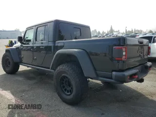 2020 Jeep Gladiator Rubicon z VIN 1C6JJTBG7LL197837, wystawiony jako Copart lot #58169095 z przebiegiem 59 578 mil mil oraz Szkoda całkowita • Salvage title. Historia ofert i sprzedaży dostępna na DreamBid. Obrazek 2.