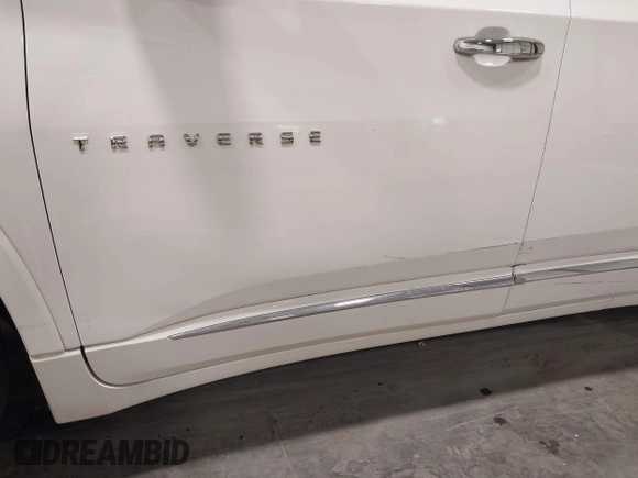 2021 Chevrolet Traverse Premier with VIN 1GNEVKKW7MJ218772, listed as a IAAI auction lot 42306743 with 106,898 mi miles and . Bid and sale history available at DreamBid. Image 6.