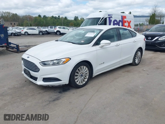 2013 Ford Fusion SE Hybrid with VIN 3FA6P0LUXDR328784, listed as a IAAI auction lot 42231399 with 169,462 mi miles and . Bid and sale history available at carsss.com. Image 2.