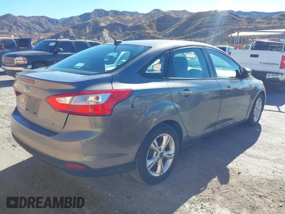 2014 Ford Focus SE with VIN 1FADP3F28EL230114, listed as a IAAI auction lot 41016783 with 66,060 mi miles. Bid and sale history available at carsss.com. Image 4.