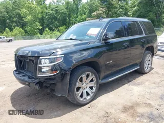 2016 Chevrolet Tahoe LT with VIN 1GNSCBKC5GR137919, listed as a IAAI auction lot 42334905 with 178,837 mi miles and . Bid and sale history available at DreamBid. Image 2.
