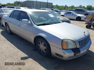 2003 Cadillac DeVille z VIN 1G6KD54Y23U233081, wystawiony jako IAAI lot #41994602 z przebiegiem 141 245 mil mil oraz . Historia ofert i sprzedaży dostępna na DreamBid. Obrazek 1.