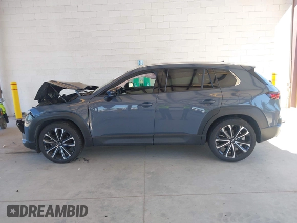 2023 Mazda CX-50 Premium Plus with VIN 7MMVABEY8PN100311, listed as a IAAI auction lot 42626276 with 40,242 mi miles and . Bid and sale history available at DreamBid. Image 14.