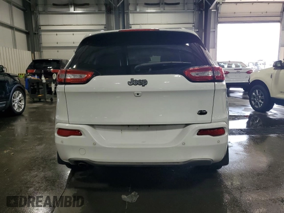 2016 Jeep Cherokee Overland with VIN 1C4PJLJB0GW302604, listed as a Copart auction lot 70624834 with 96,394 mi miles and Salvage title. Bid and sale history available at DreamBid. Image 6.