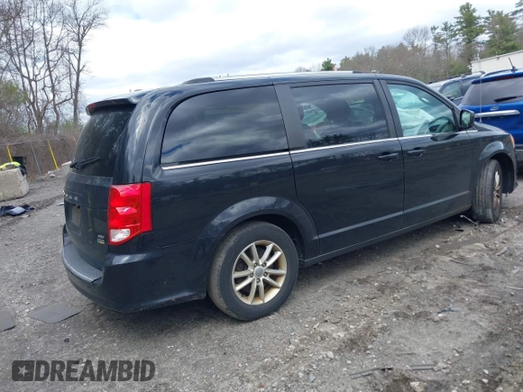 2019 Dodge Grand Caravan SXT with VIN 2C4RDGCG9KR804867, listed as a IAAI auction lot 42032311 with 157,351 mi miles and . Bid and sale history available at DreamBid. Image 4.