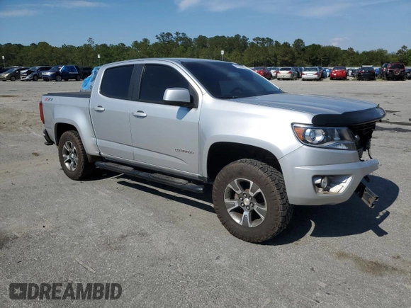 2016 Chevrolet Colorado 4WD Z71 with VIN 1GCGTDE33G1170065, listed as a Copart auction lot 55920665 with 135,410 mi miles and Salvage title. Bid and sale history available at DreamBid. Image 4.