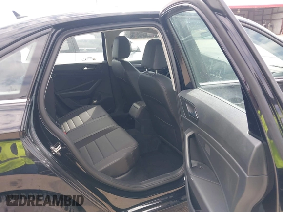 2024 Volkswagen Jetta SE with VIN 3VW7M7BU0RM059133, listed as a IAAI auction lot 42553729 with 13,091 mi miles and . Bid and sale history available at DreamBid. Image 8.