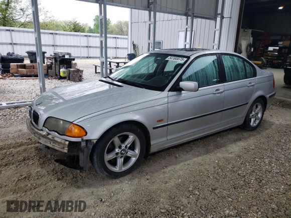2000 BMW 3 Series 323i with VIN WBAAM3348YFP73443, listed as a Copart auction lot 54165575 with 334,761 mi miles and Salvage title. Bid and sale history available at DreamBid. Image 1.