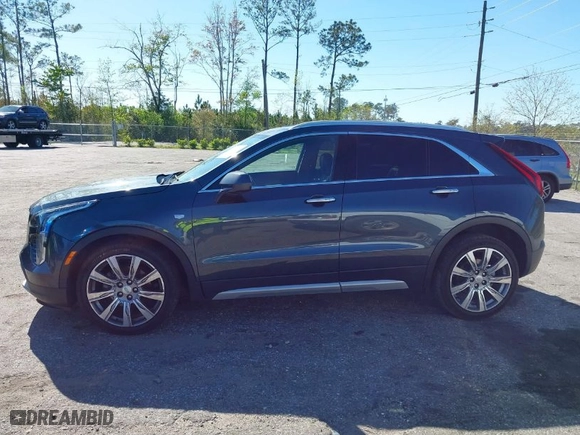 2019 Cadillac XT4 FWD Premium Luxury with VIN 1GYFZCR41KF204050, listed as a IAAI auction lot 41829040 with 69,136 mi miles. Bid and sale history available at carsss.com. Image 14.