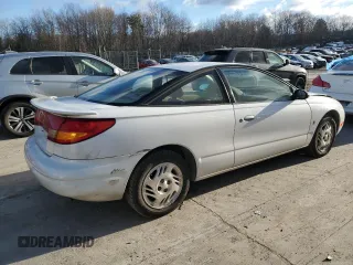 1999 Saturn SC with VIN 1G8ZR1275XZ375833, listed as a Copart auction lot 87960885 with 97,697 mi miles and Salvage Title. Bid and sale history available at carsss.com. Image 3.