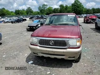 2000 Mercury Mountaineer with VIN 4M2ZU86P2YUJ30049, listed as a Copart auction lot 58619545 with 149,673 mi miles and Salvage title. Bid and sale history available at DreamBid. Image 14.