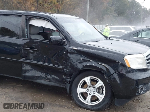 2014 Honda Pilot EX-L with VIN 5FNYF3H50EB024598, listed as a IAAI auction lot 40864689 with 159,078 mi miles and . Bid and sale history available at DreamBid. Image 6.