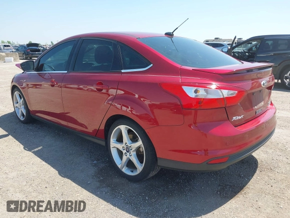 2013 Ford Focus Titanium with VIN 1FADP3J23DL334161, listed as a IAAI auction lot 41987758 with 117,665 mi miles and . Bid and sale history available at carsss.com. Image 3.