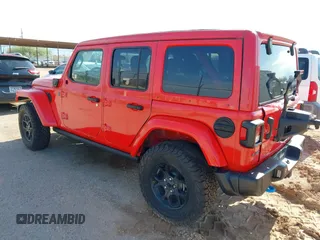 2024 Jeep Wrangler Sport S with VIN 1C4RJXN64RW141013, listed as a IAAI auction lot 42806441 with 5,893 mi miles and . Bid and sale history available at DreamBid. Image 3.