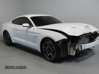 2021 Ford Mustang GT with VIN 1FA6P8CF1M5110879, listed as a Copart auction lot 53738305 with 61,243 mi miles and Salvage Title. Bid and sale history available at carsss.com. Image 1.