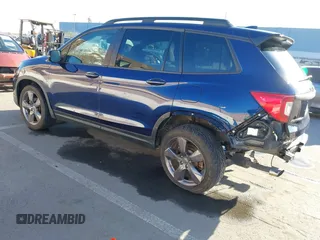 2020 Honda Passport Touring with VIN 5FNYF7H90LB004665, listed as a IAAI auction lot 41669821 with 59,768 mi miles and . Bid and sale history available at DreamBid. Image 3.