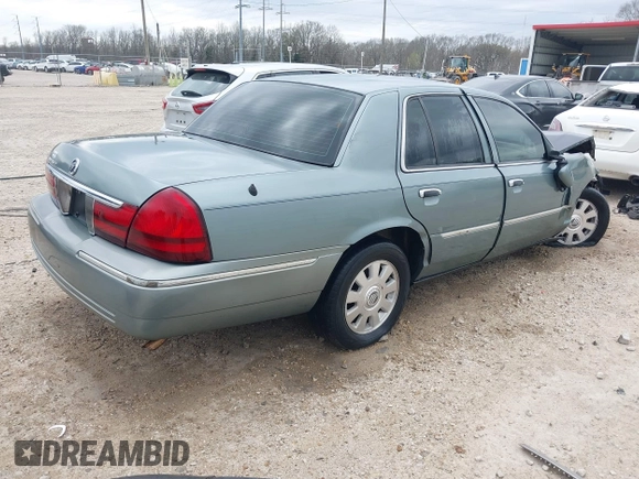 2005 Mercury Grand Marquis LS Premium z VIN 2MEHM75W45X662040, wystawiony jako IAAI lot #41697234 z przebiegiem 214 410 mil mil oraz . Historia ofert i sprzedaży dostępna na DreamBid. Obrazek 4.