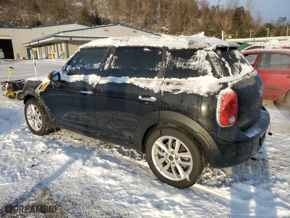 2012 MINI Cooper Countryman with VIN WMWZB3C52CWM01767, listed as a Copart auction lot 41581095 with 126282 miles and Salvage Title. Bid and sale history available at carsss.com. Image 2.