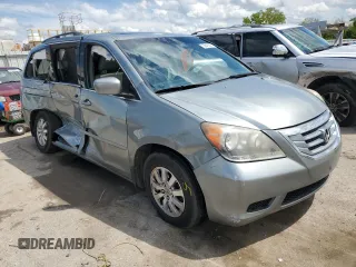 2010 Honda Odyssey EX-L с VIN 5FNRL3H79AB073307, выставлен на аукционе Copart как лот 55642225 с пробегом Не указан миль и Списание • Salvage title. История ставок и продаж доступна на DreamBid. Изображение 4.