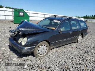 1999 Mercedes-Benz E-Class with VIN WDBJH82F8XX020574, listed as a Copart auction lot 63730124 with 201,401 mi miles and Salvage Title. Bid and sale history available at carsss.com. Image 1.