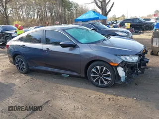 2017 Honda Civic Sedan LX with VIN 19XFC2F56HE233741, listed as a IAAI auction lot 42022068 with 65,587 mi miles. Bid and sale history available at carsss.com. Image 13.