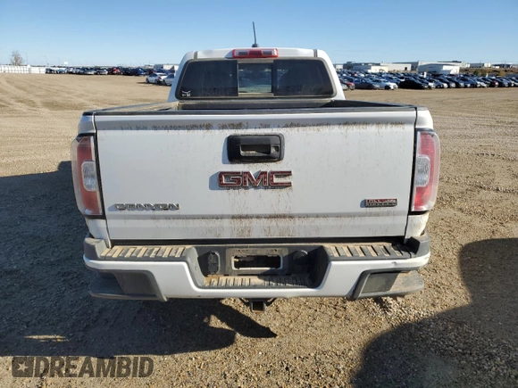 2018 GMC Canyon 4WD SLT with VIN 1GTP6DE13J1269627, listed as a Copart auction lot 73349774 with 191,385 mi miles and Salvage Title. Bid and sale history available at carsss.com. Image 6.