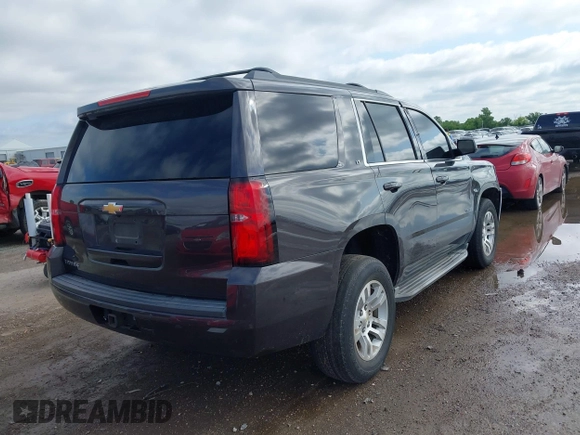 2015 Chevrolet Tahoe LT with VIN 1GNSCBKC2FR632173, listed as a IAAI auction lot 42135105 with 150,033 mi miles and . Bid and sale history available at DreamBid. Image 4.
