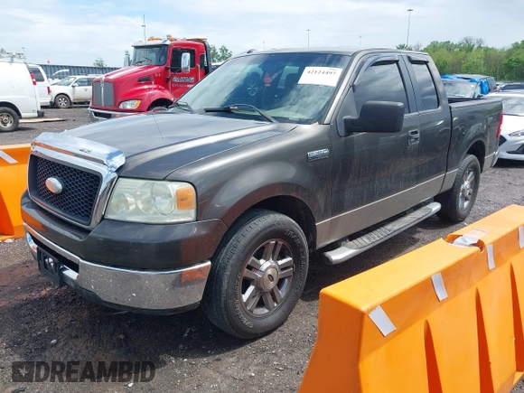 2006 Ford F-150 STX with VIN 1FTRX12W26FA38619, listed as a IAAI auction lot 42124497 with 215,306 mi miles. Bid and sale history available at carsss.com. Image 2.