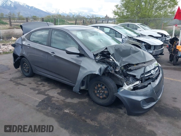 2015 Hyundai Accent GLS with VIN KMHCT4AE8FU825898, listed as a IAAI auction lot 42066640 with 79,593 mi miles and . Bid and sale history available at DreamBid. Image 1.