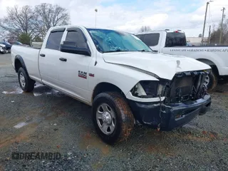 2018 Ram 2500 Tradesman with VIN 3C7WR4HJ2JG253700, listed as a IAAI auction lot 41614284 with 119,662 mi miles. Bid and sale history available at carsss.com. Image 1.