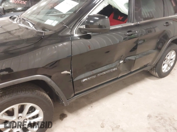 2021 Jeep Grand Cherokee Laredo X with VIN 1C4RJFAG0MC655489, listed as a IAAI auction lot 41886475 with 39,147 mi miles and . Bid and sale history available at DreamBid. Image 6.