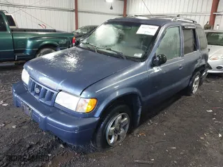 2002 Kia Sportage with VIN KNDJB723X25134499, listed as a IAAI auction lot 41273605 with 1 mi miles. Bid and sale history available at carsss.com. Image 16.