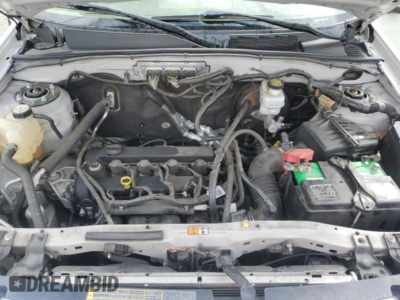 2010 Ford Escape Limited with VIN 1FMCU0E74AKC89196, listed as a Copart auction lot 50990585 with 144,830 mi miles and Salvage title. Bid and sale history available at DreamBid. Image 12.