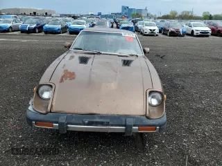 1979 Datsun 280ZX z VIN HGS130115983, wystawiony jako Copart lot #54709755 z przebiegiem 74 026 mil mil oraz Tytuł czysty. Historia ofert i sprzedaży dostępna na DreamBid. Obrazek 5.