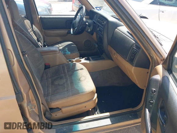 1999 Jeep Cherokee Sport with VIN 1J4FT68S1XL528885, listed as a IAAI auction lot 42536873 with Not provided miles and . Bid and sale history available at DreamBid. Image 5.