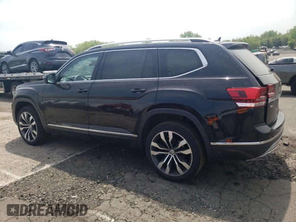2019 Volkswagen Atlas SEL Premium z VIN 1V2NR2CAXKC620253, wystawiony jako Copart lot #56583635 z przebiegiem 57 734 mil mil oraz Szkoda całkowita • Salvage title. Historia ofert i sprzedaży dostępna na DreamBid. Obrazek 2.
