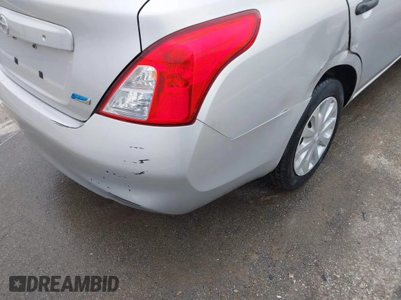 2014 Nissan Versa SV with VIN 3N1CN7APXEL860715, listed as a IAAI auction lot 41492046 with 95,758 mi miles and . Bid and sale history available at DreamBid. Image 17.