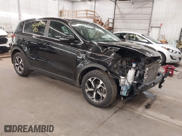 2020 Kia Sportage LX with VIN KNDPMCACXL7804797, listed as a IAAI auction lot 42011299 with 49,793 mi miles and . Bid and sale history available at carsss.com. Image 1.