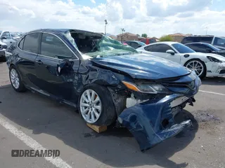 2019 Toyota Camry LE z VIN 4T1B11HK2KU757247, wystawiony jako IAAI lot #42211333 z przebiegiem Nie podano mil oraz . Historia ofert i sprzedaży dostępna na DreamBid. Obrazek 1.