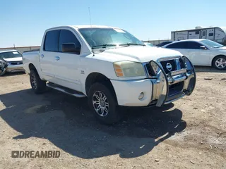 2004 Nissan Titan LE z VIN 1N6AA07B14N528418, wystawiony jako IAAI lot #42281318 z przebiegiem 200 902 mil mil oraz . Historia ofert i sprzedaży dostępna na DreamBid. Obrazek 1.