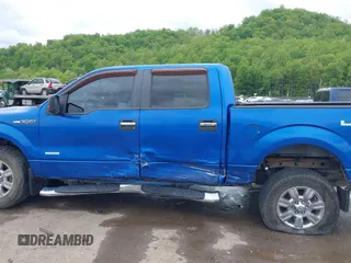 2011 Ford F-150 XLT with VIN 1FTFW1ET7BFB22128, listed as a IAAI auction lot 42214865 with 238,616 mi miles and . Bid and sale history available at DreamBid. Image 14.