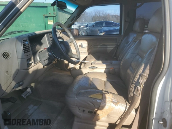 1999 GMC Yukon with VIN 1GKEC13R6XJ808715, listed as a Copart auction lot 83407094 with 340,933 mi miles and Salvage Title. Bid and sale history available at carsss.com. Image 7.