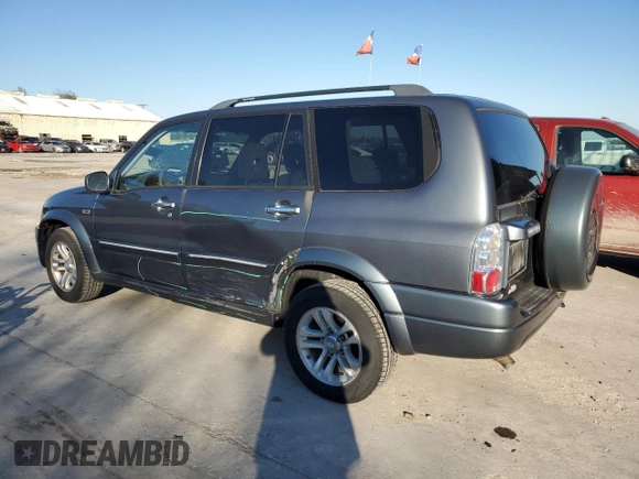 2005 Suzuki XL7 LX z VIN JS3TY92V554107839, wystawiony jako Copart lot #88328455 z przebiegiem 122 912 mil mil oraz Szkoda całkowita • Salvage title. Historia ofert i sprzedaży dostępna na DreamBid. Obrazek 2.