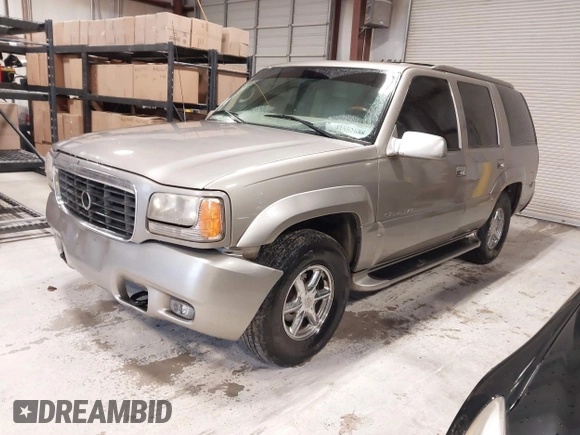 1999 Cadillac Escalade z VIN 1GYEK13RXXR413480, wystawiony jako IAAI lot #41552688 z przebiegiem 214 501 mil mil oraz . Historia ofert i sprzedaży dostępna na DreamBid. Obrazek 17.
