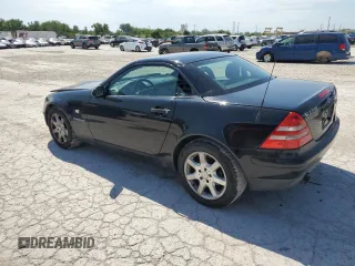 1999 Mercedes-Benz SLK-Class with VIN WDBKK47F5XF129037, listed as a Copart auction lot 68842504 with 74,397 mi miles and Salvage Title. Bid and sale history available at carsss.com. Image 2.