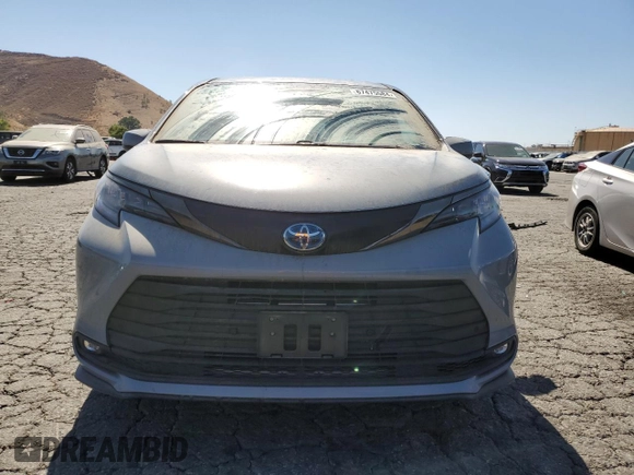 2022 Toyota Sienna XLE Woodland Edition with VIN 5TDASKFC1NS057260, listed as a Copart auction lot 67475584 with 59,396 mi miles and Salvage Title. Bid and sale history available at carsss.com. Image 5.